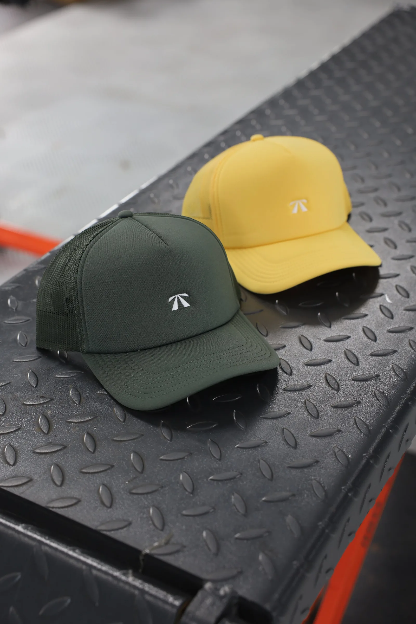 The Puff Trucker Cap by Roadbloc, in Cyprus Green and Sunset Yellow