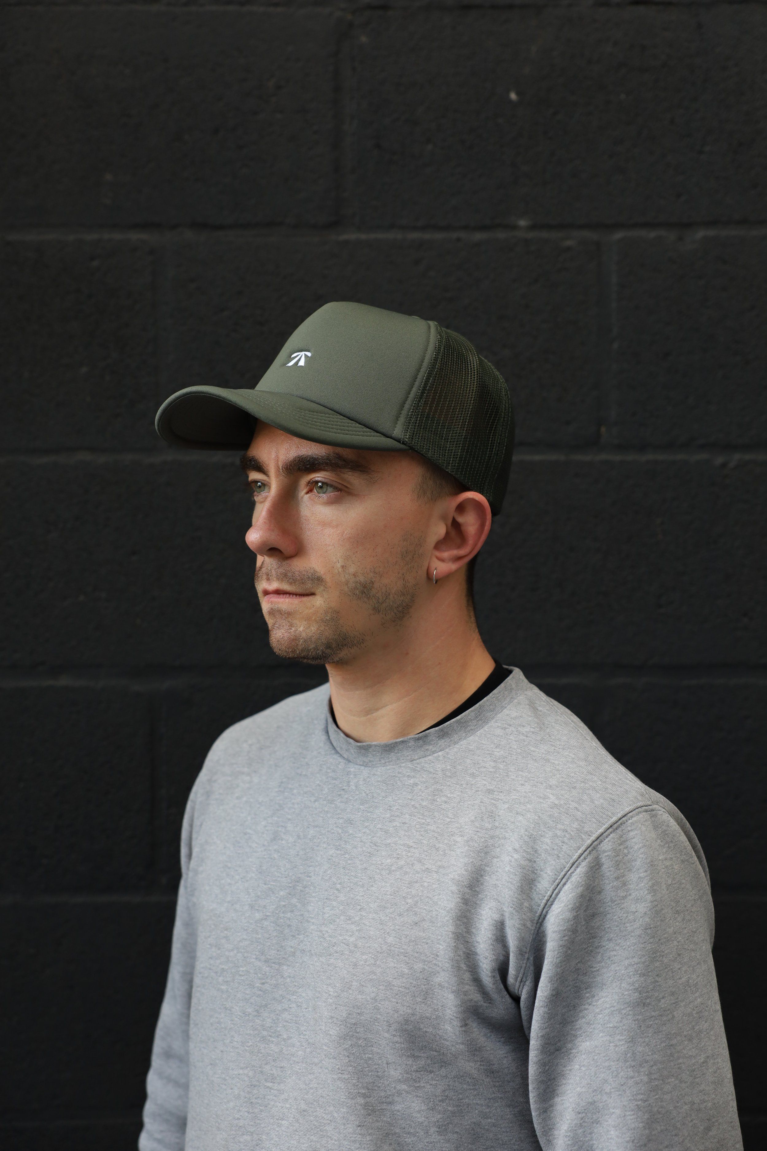 The Puff Trucker Cap by Roadbloc, in Cyprus Green and Sunset Yellow