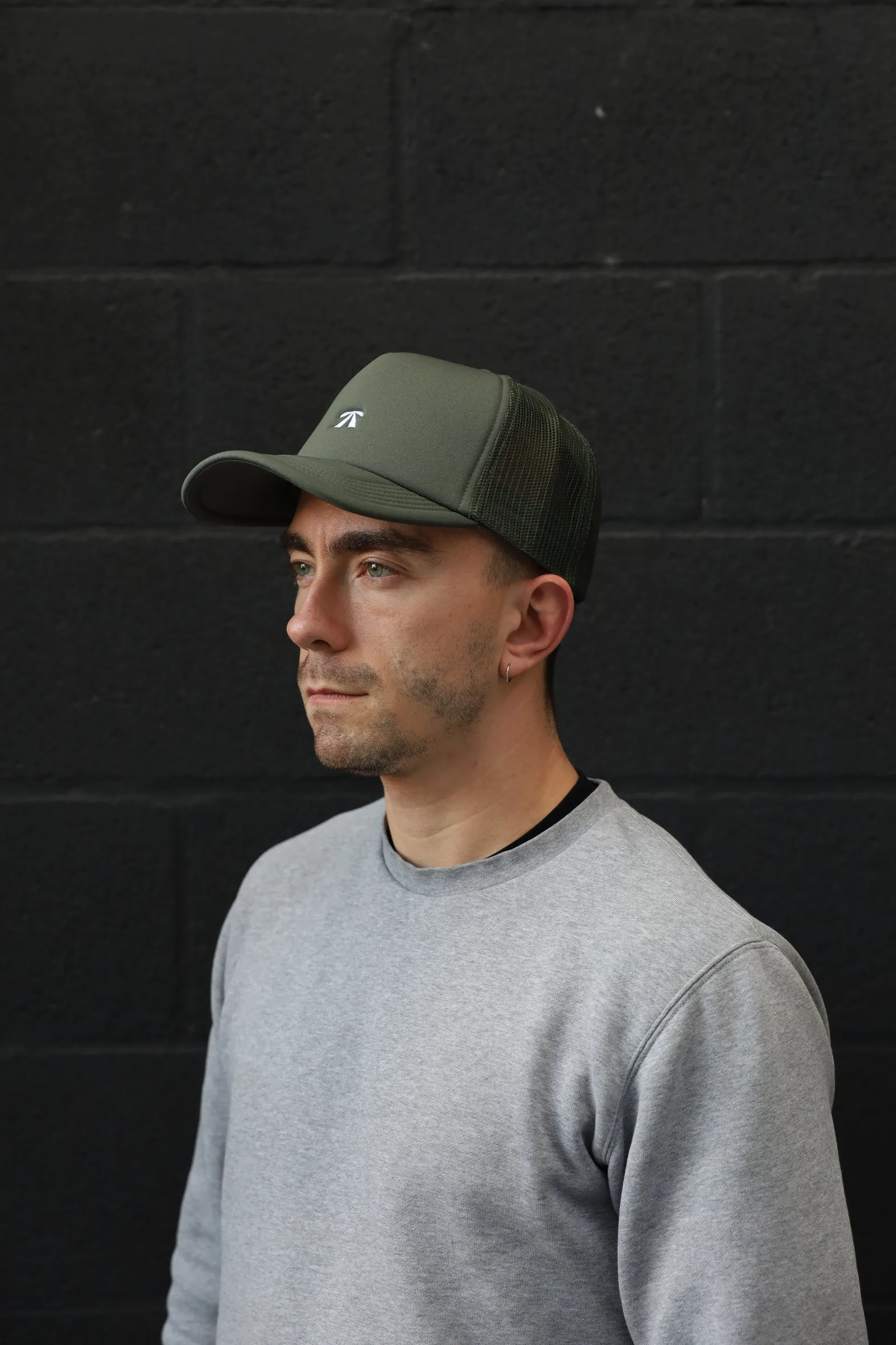 The Puff Trucker Cap by Roadbloc, in Cyprus Green and Sunset Yellow