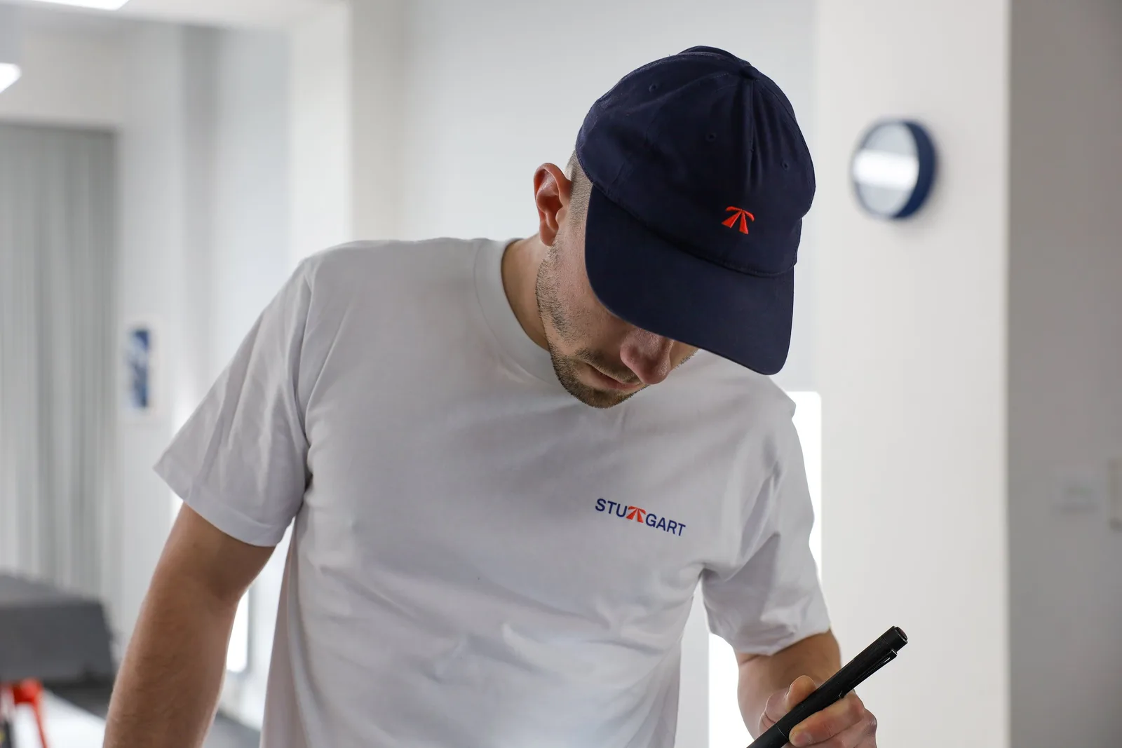 The RB Dad Cap by Roadbloc, in black and white or navy and orange