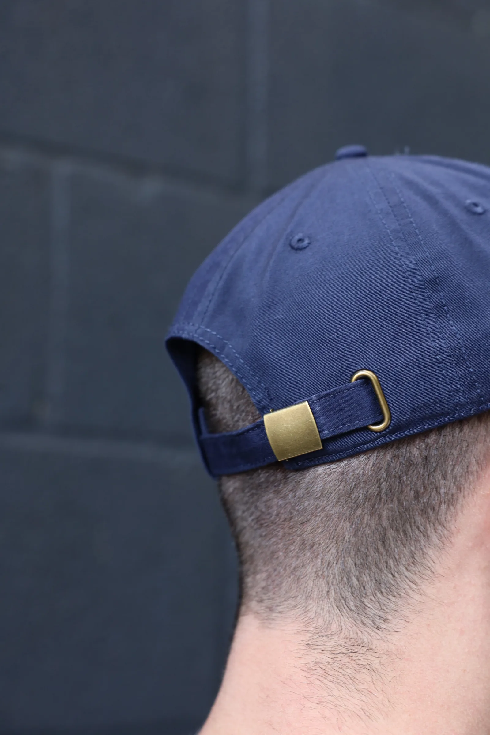 The RB Dad Cap by Roadbloc, in black and white or navy and orange