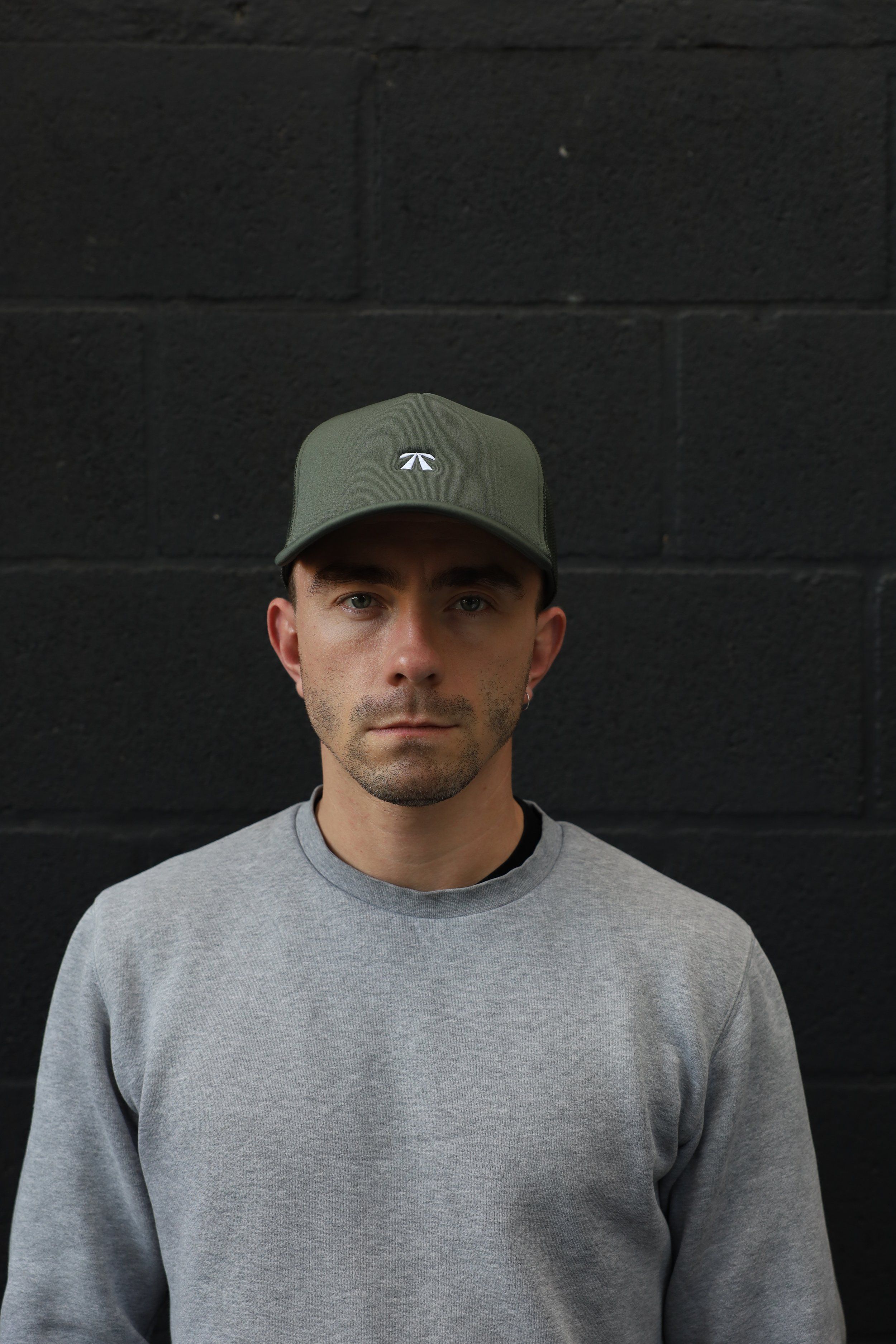 The Puff Trucker Cap by Roadbloc, in Cyprus Green and Sunset Yellow