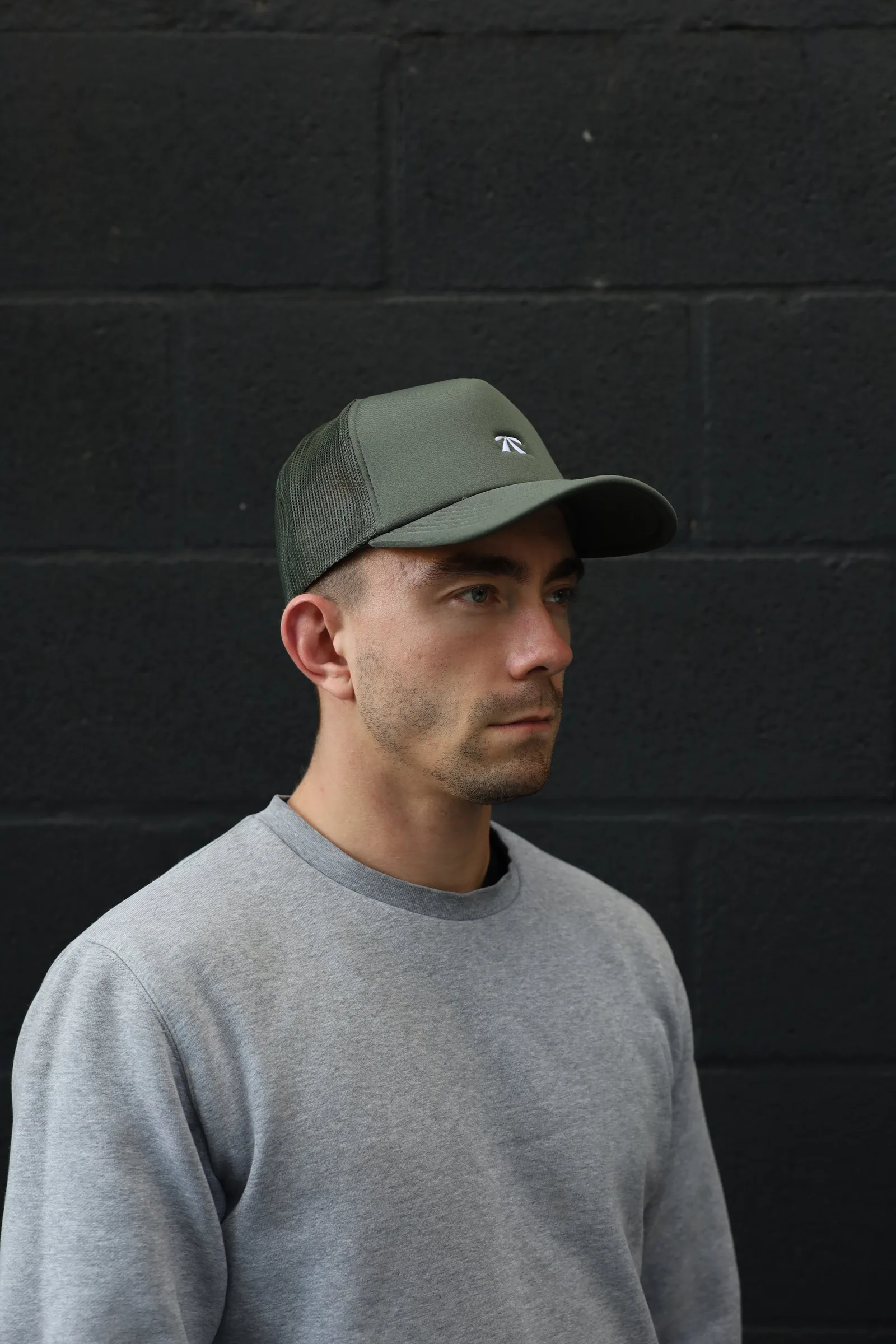 The Puff Trucker Cap by Roadbloc, in Cyprus Green and Sunset Yellow