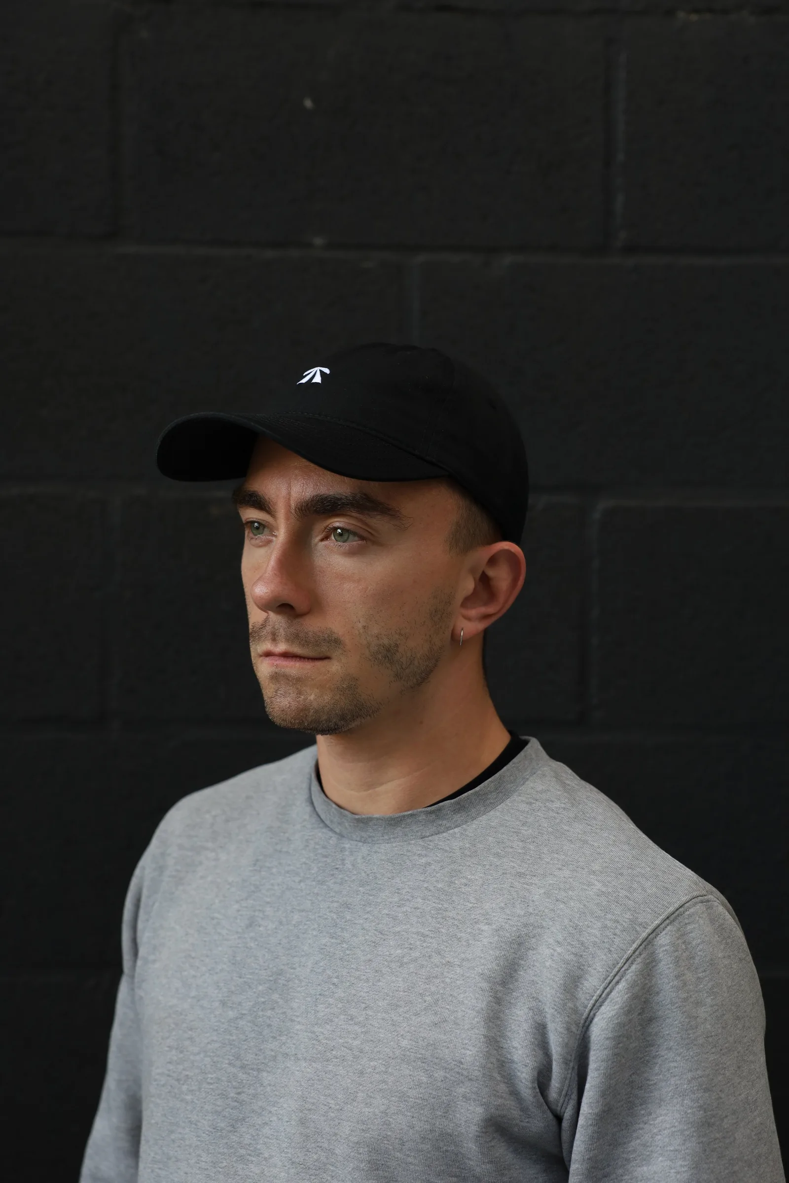 The RB Dad Cap by Roadbloc, in black and white or navy and orange