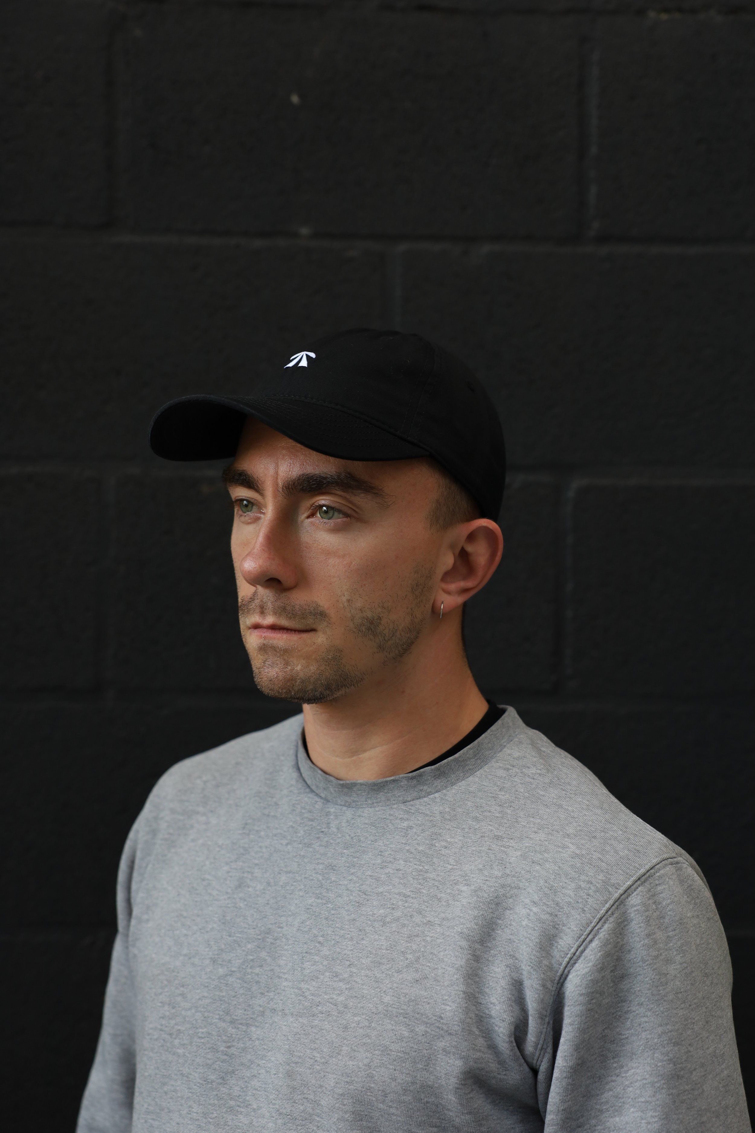 The RB Dad Cap by Roadbloc, in black and white or navy and orange