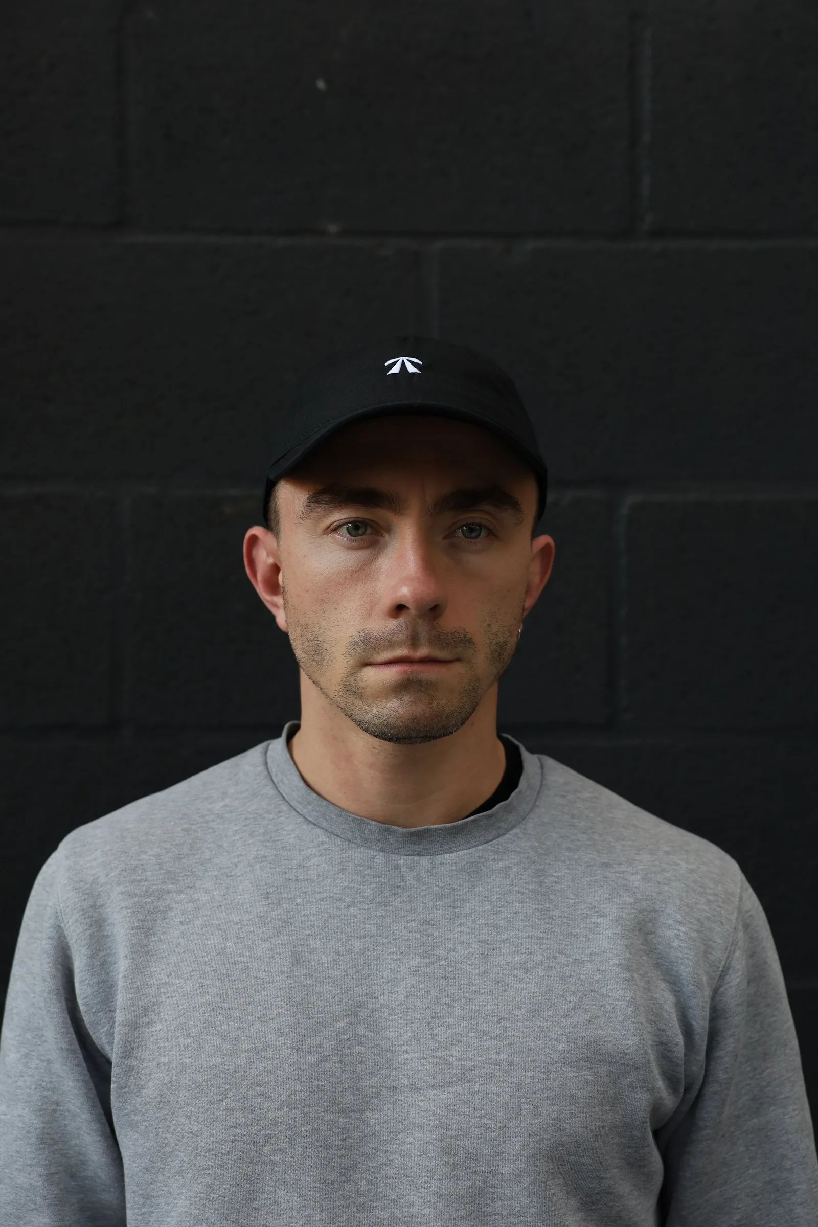The RB Dad Cap by Roadbloc, in black and white or navy and orange