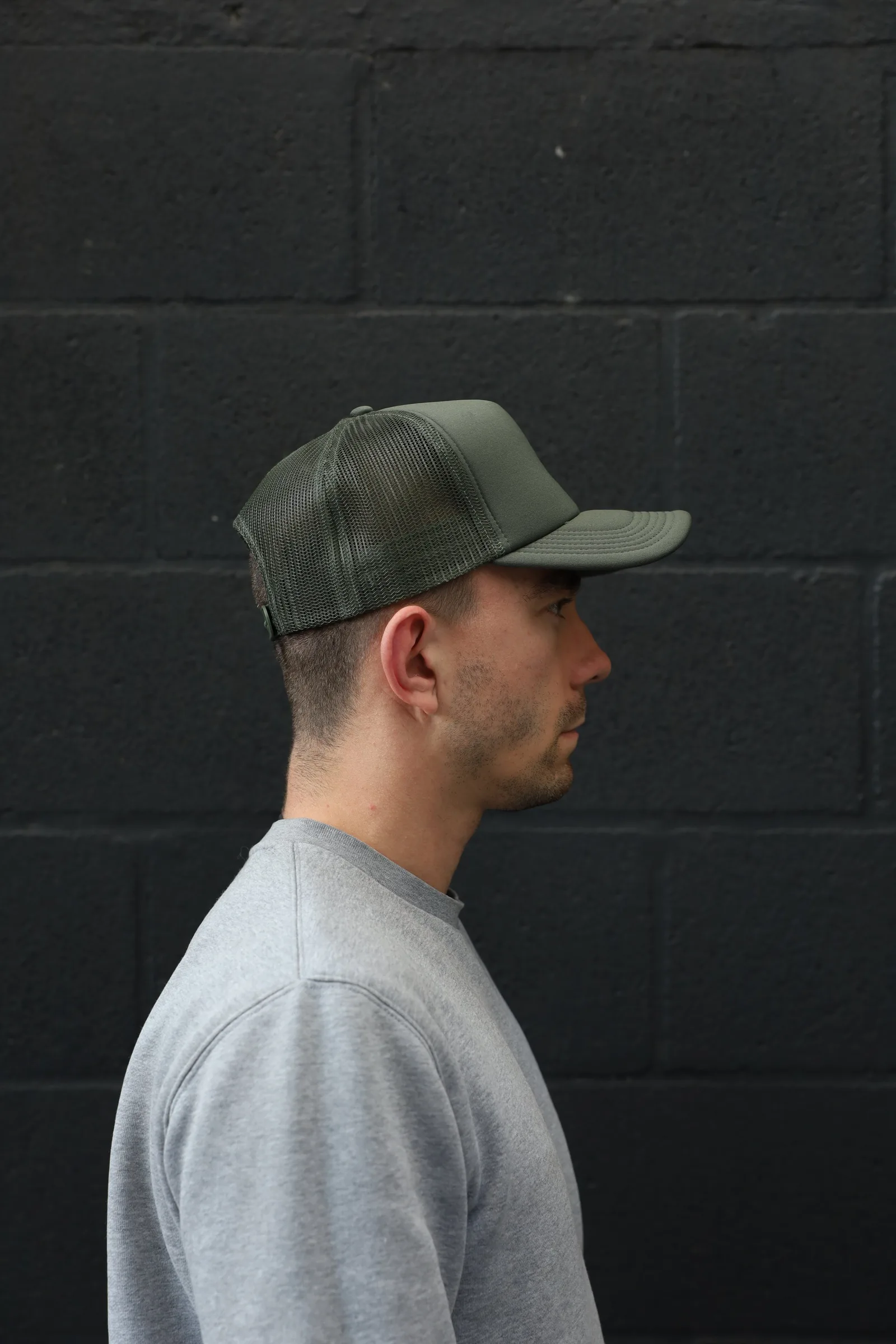The Puff Trucker Cap by Roadbloc, in Cyprus Green and Sunset Yellow