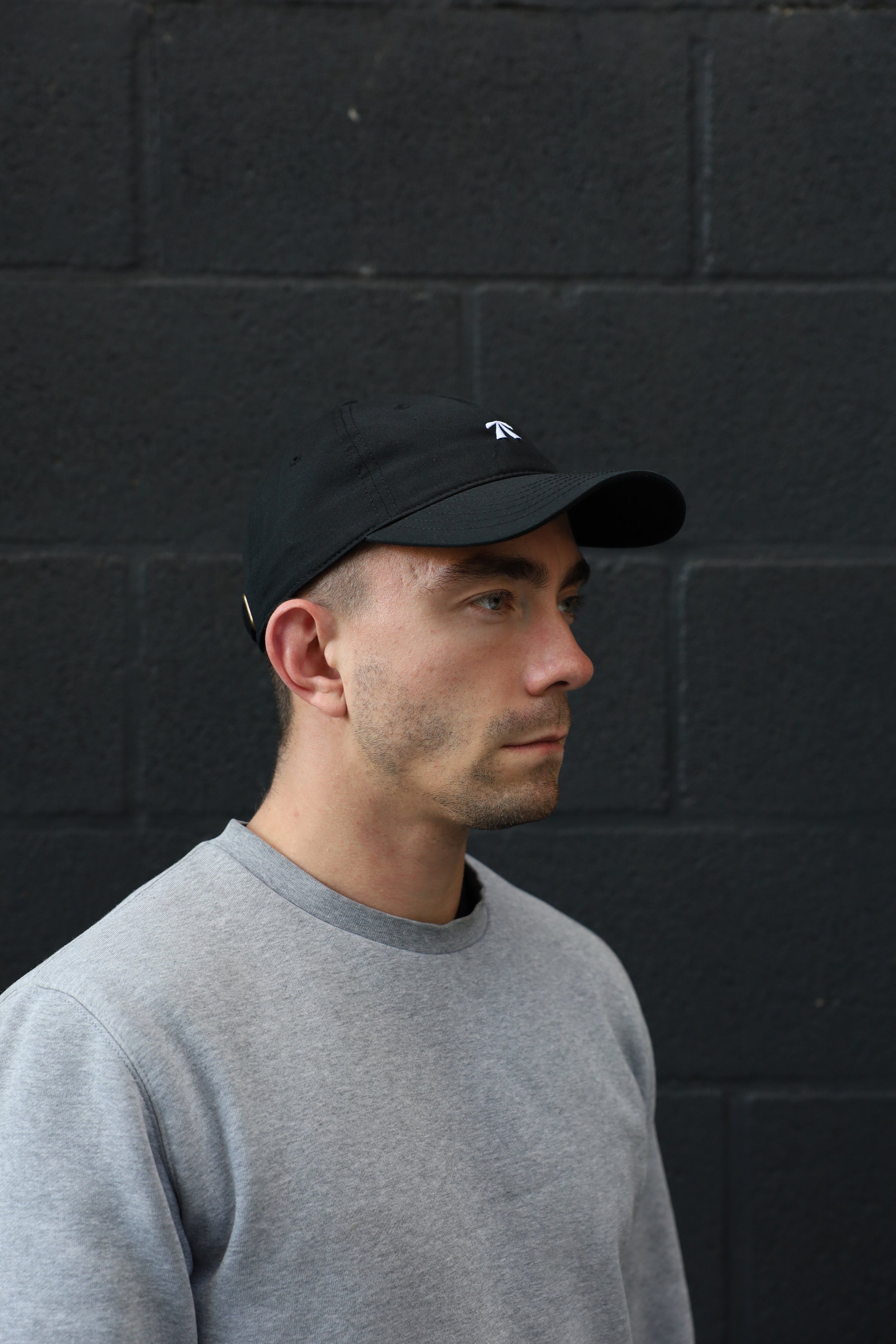 The RB Dad Cap by Roadbloc, in black and white or navy and orange
