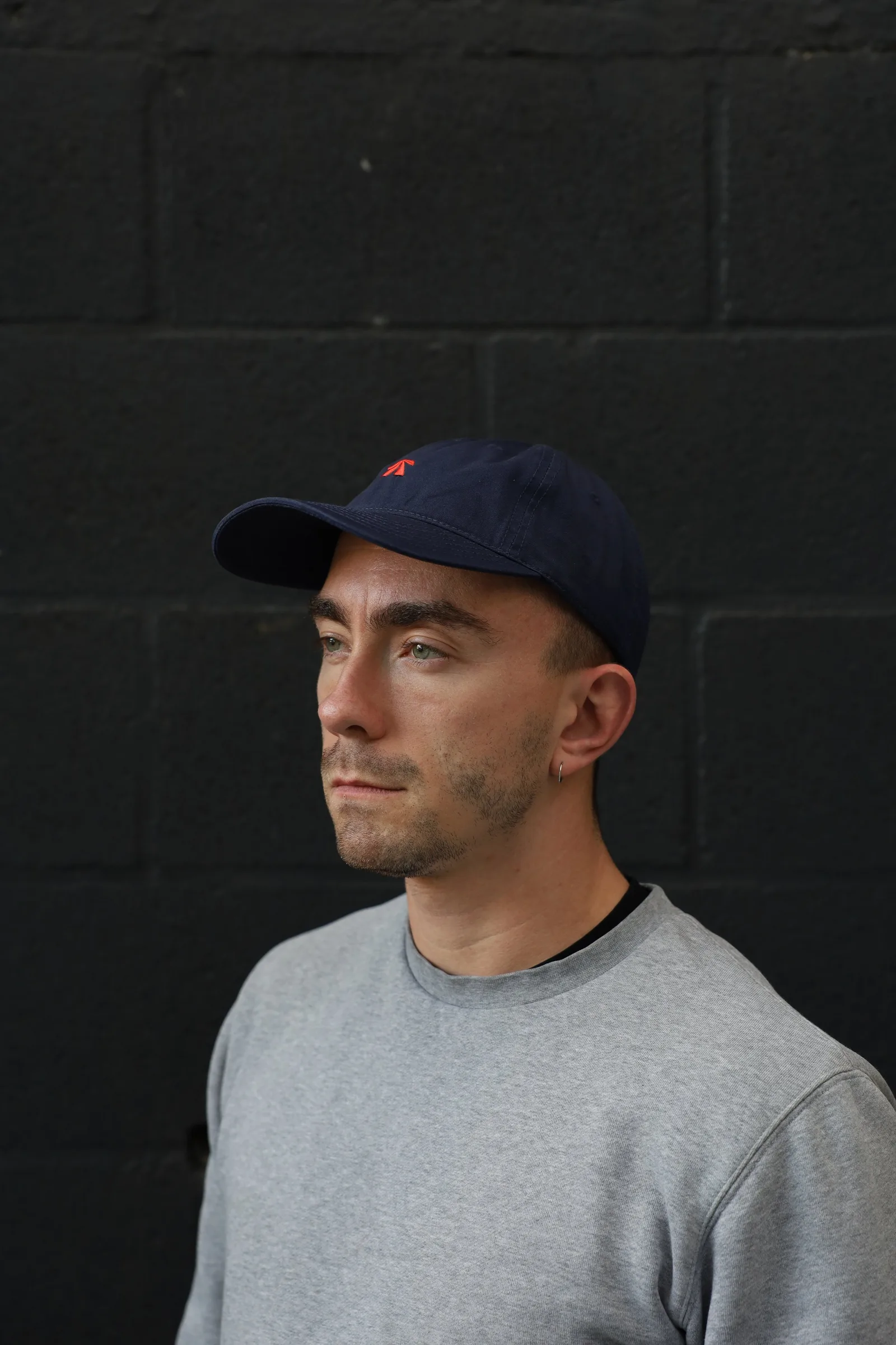 The RB Dad Cap by Roadbloc, in black and white or navy and orange