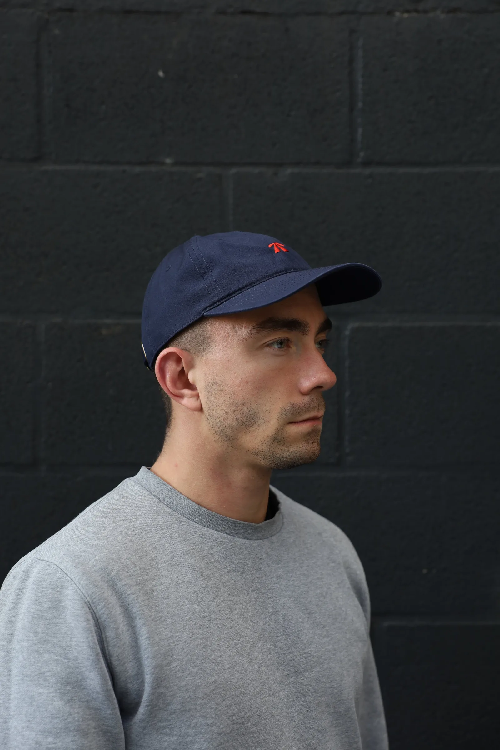 The RB Dad Cap by Roadbloc, in black and white or navy and orange