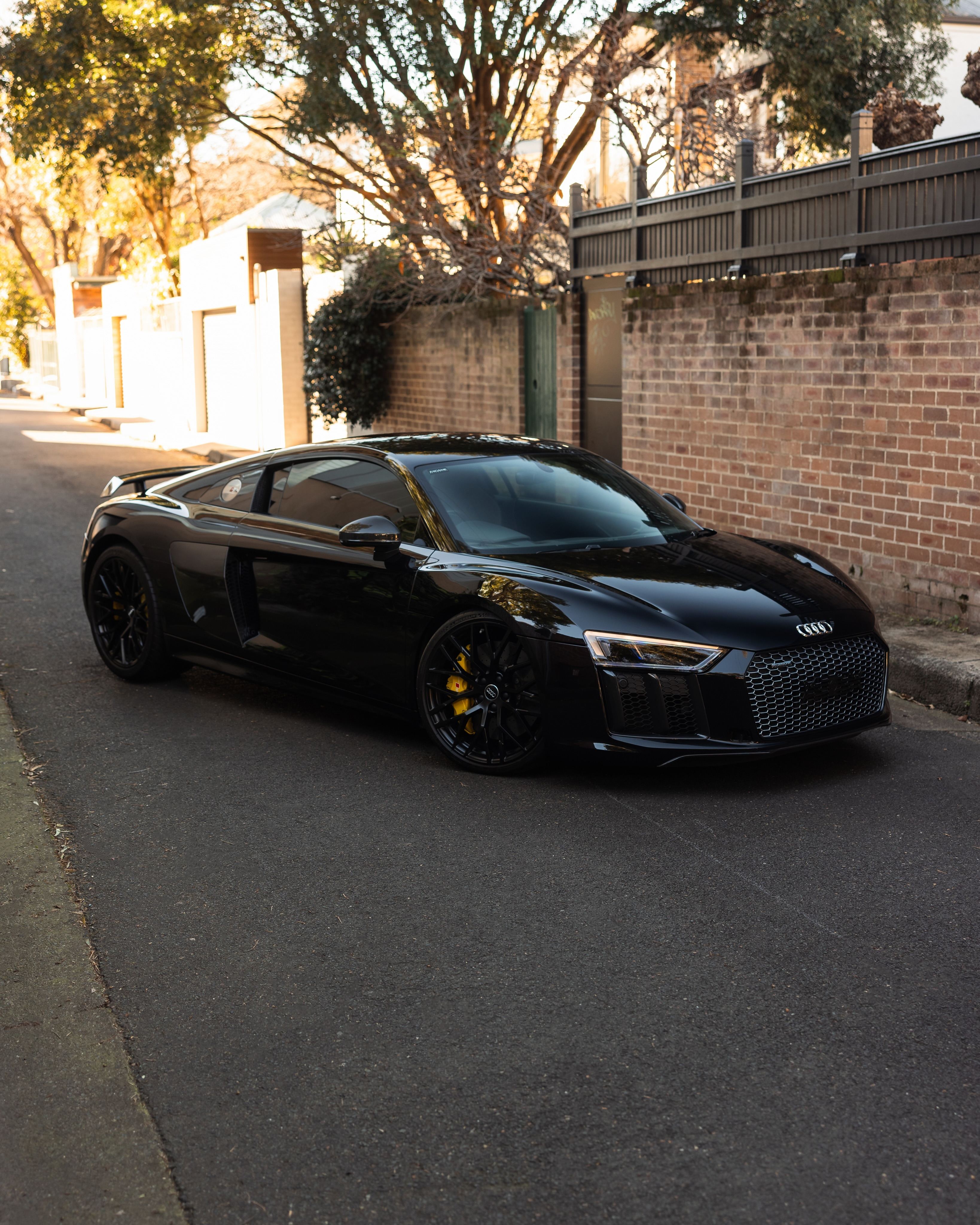Black Audi R8 parked in a Sydney back lane