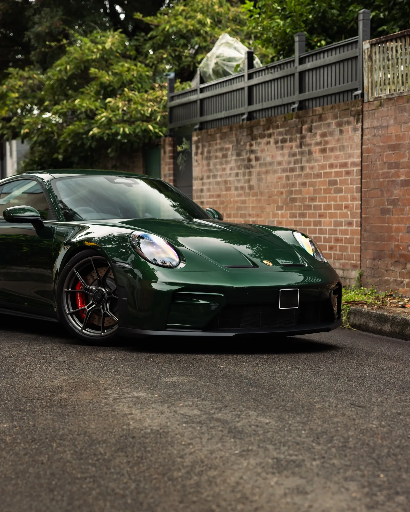 Porsche 992.2 GT3 in Oak Green Neo, protected in full paint protection film by Roadbloc
