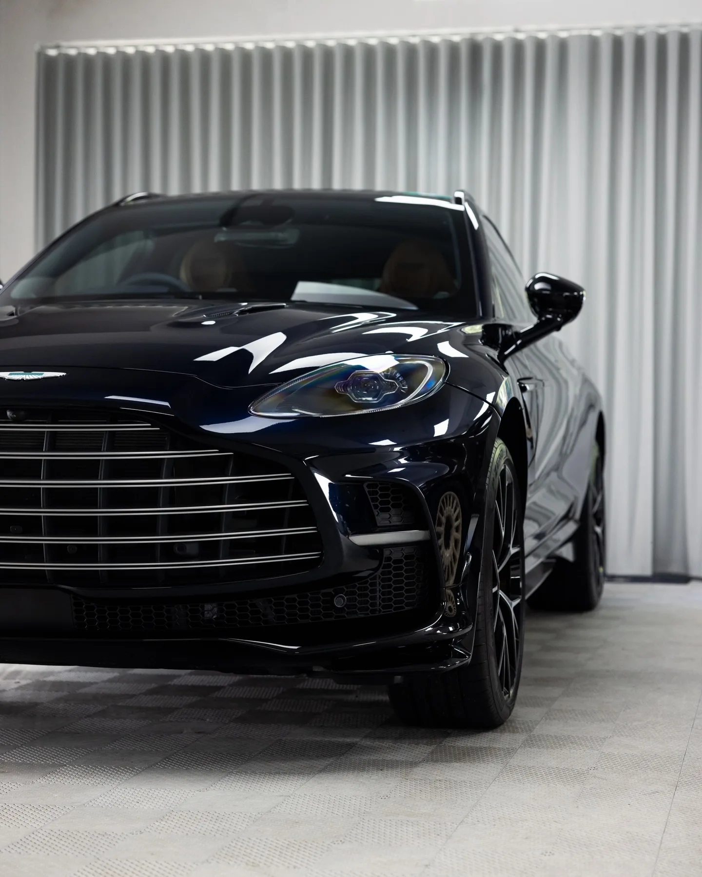 Aston Martin DBX in navy, protected in full paint protection film by Roadbloc
