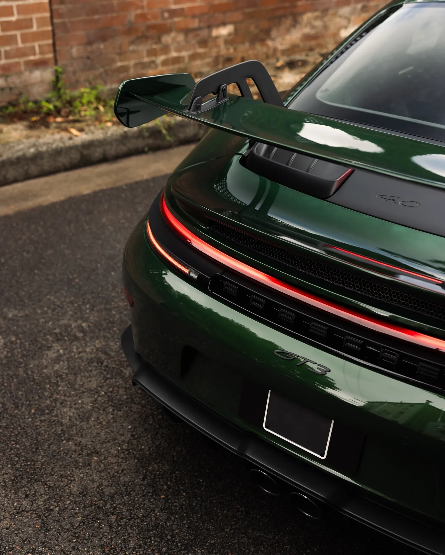 Porsche 992.2 GT3 in Oak Green Neo, protected in full paint protection film by Roadbloc