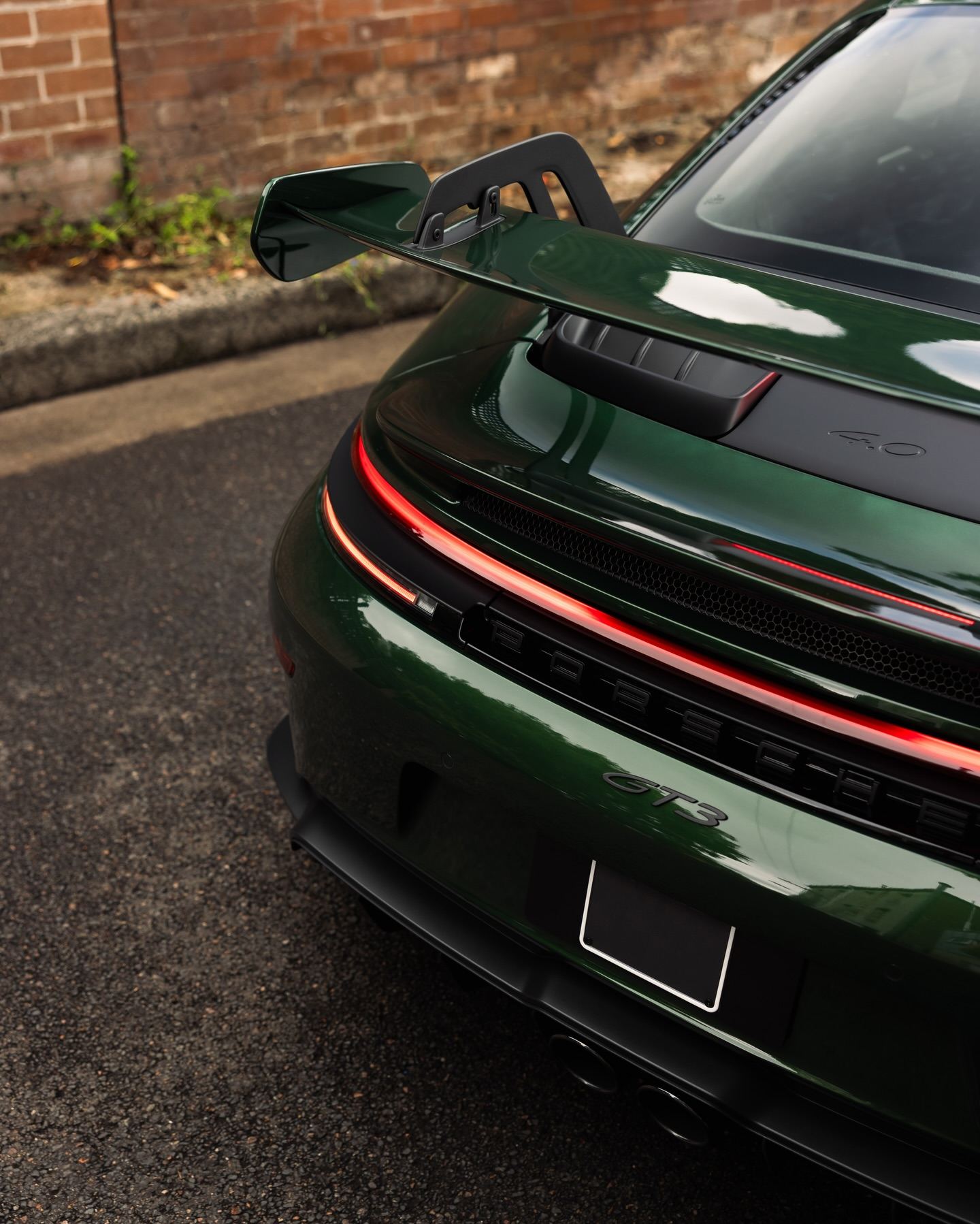 Porsche 992.2 GT3 in Oak Green Neo, protected in full paint protection film by Roadbloc