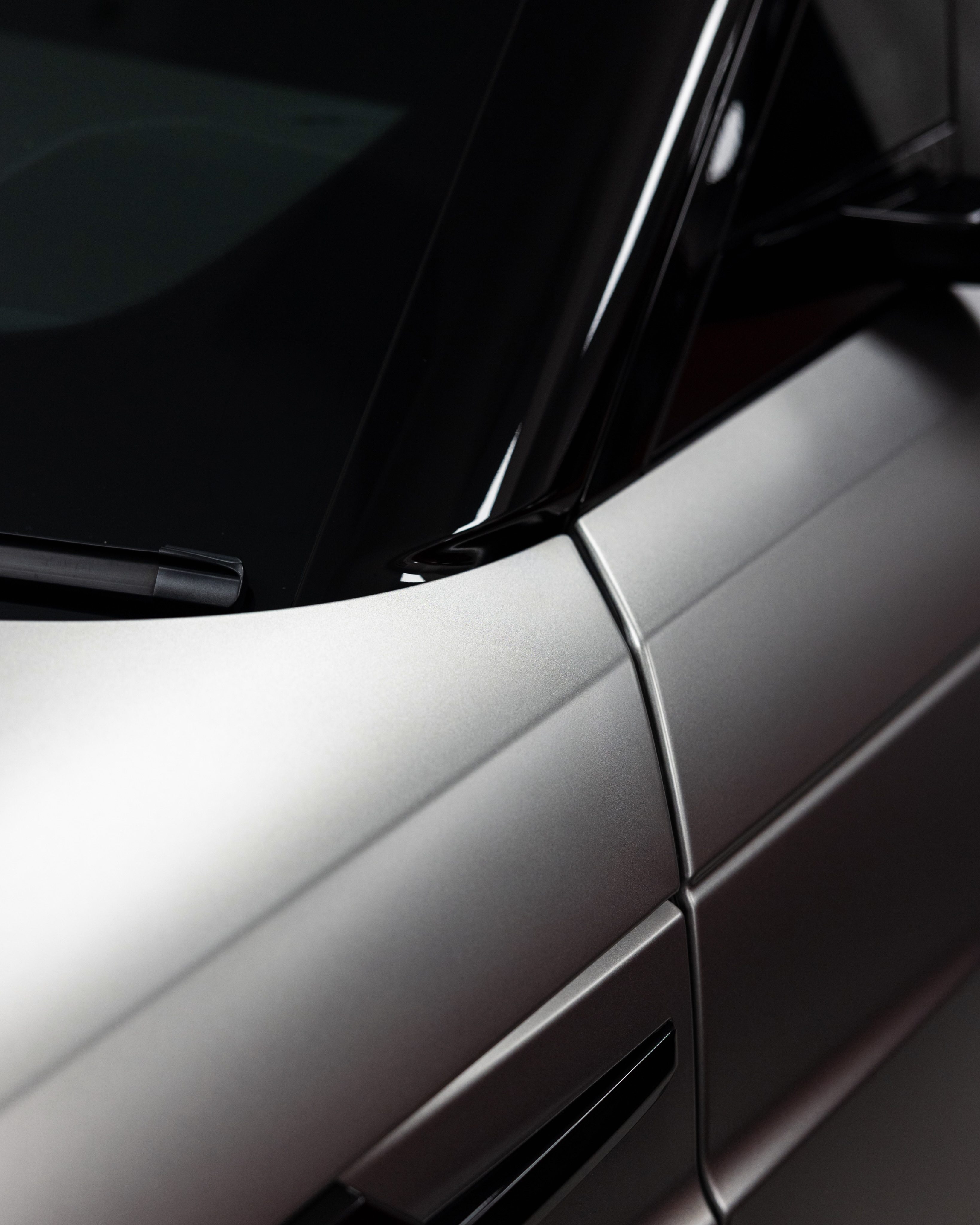 Light sweeping evenly across the Range Rover's coated matte panel