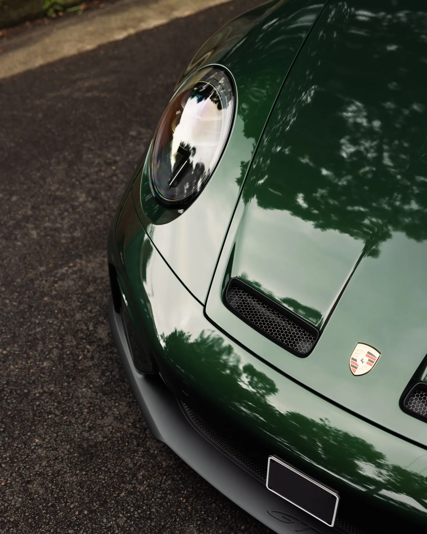 Porsche 992.2 GT3 in Oak Green Neo, protected in full paint protection film by Roadbloc
