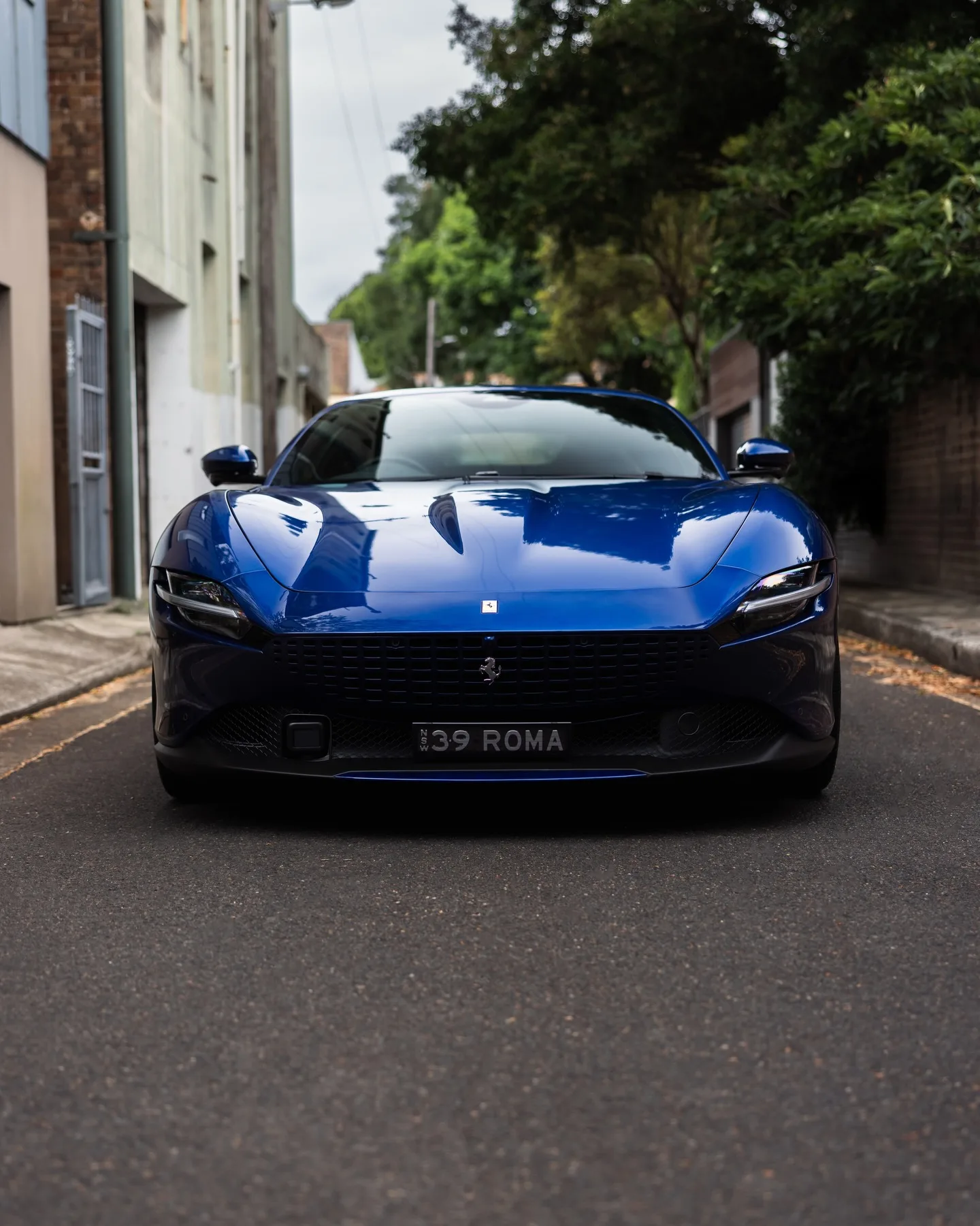 Blue Ferrari Roma protected in full paint protection film by Roadbloc