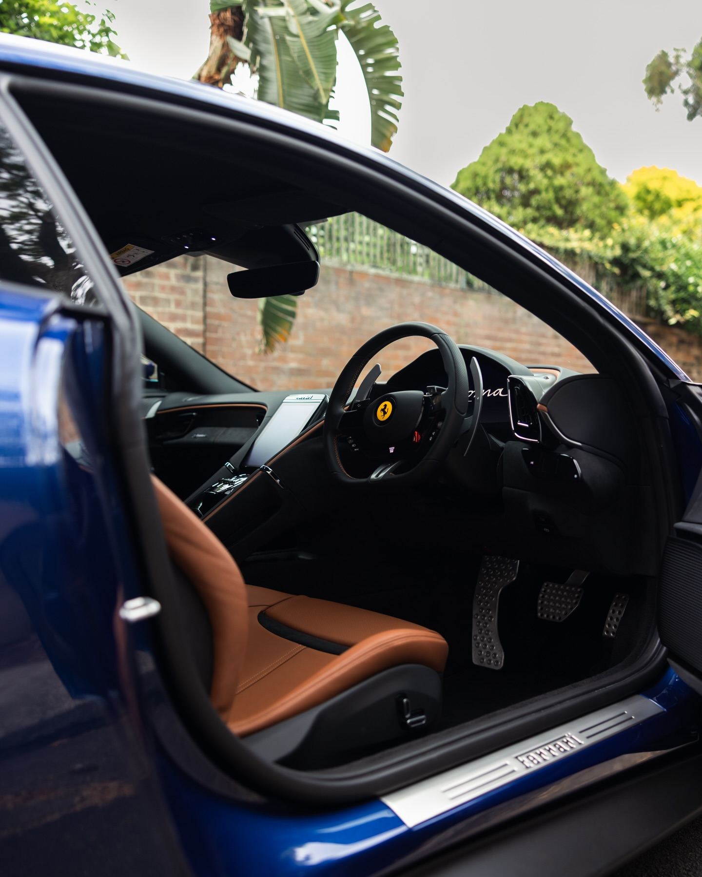 Blue Ferrari Roma protected in full paint protection film by Roadbloc