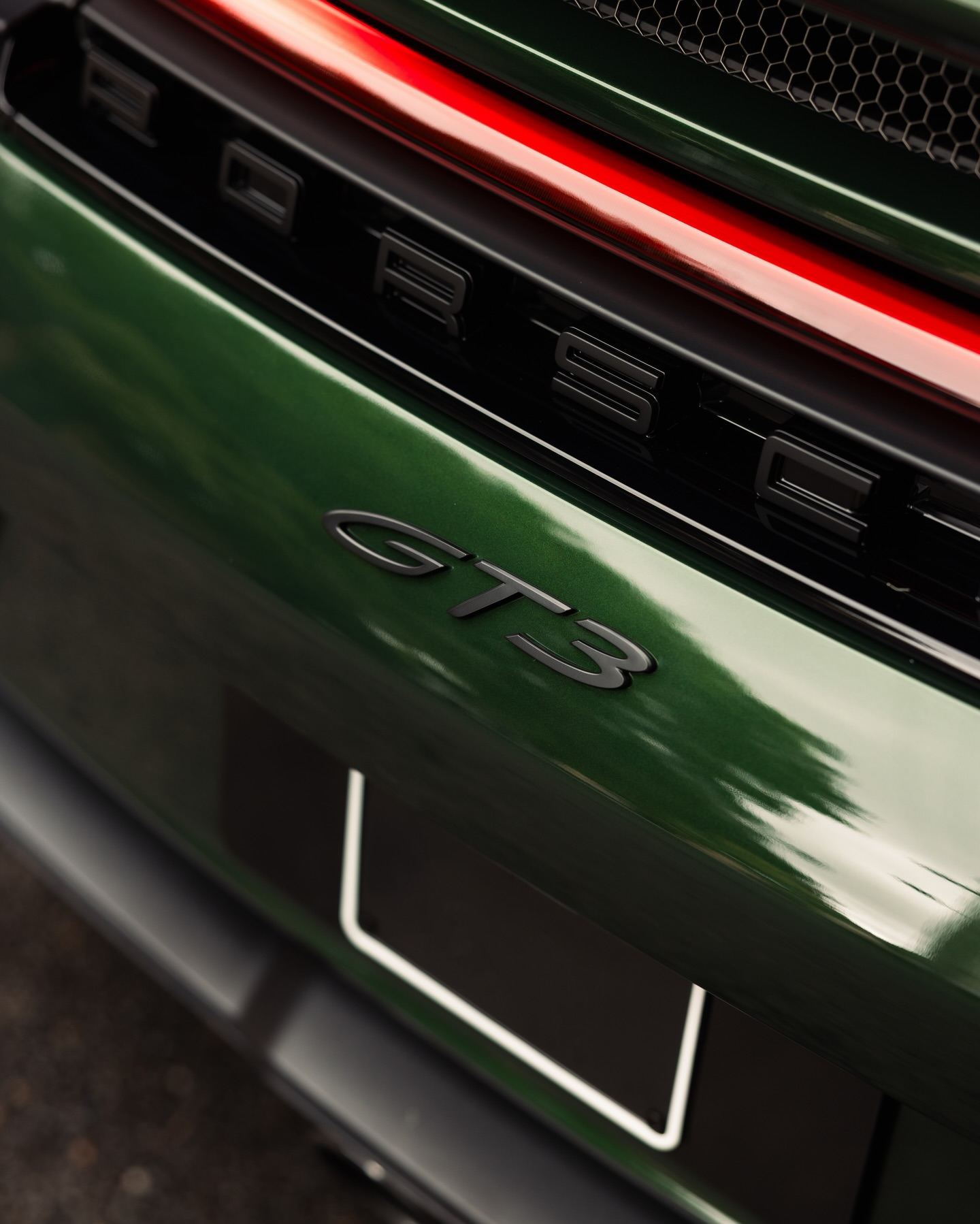 Porsche 992.2 GT3 in Oak Green Neo, protected in full paint protection film by Roadbloc