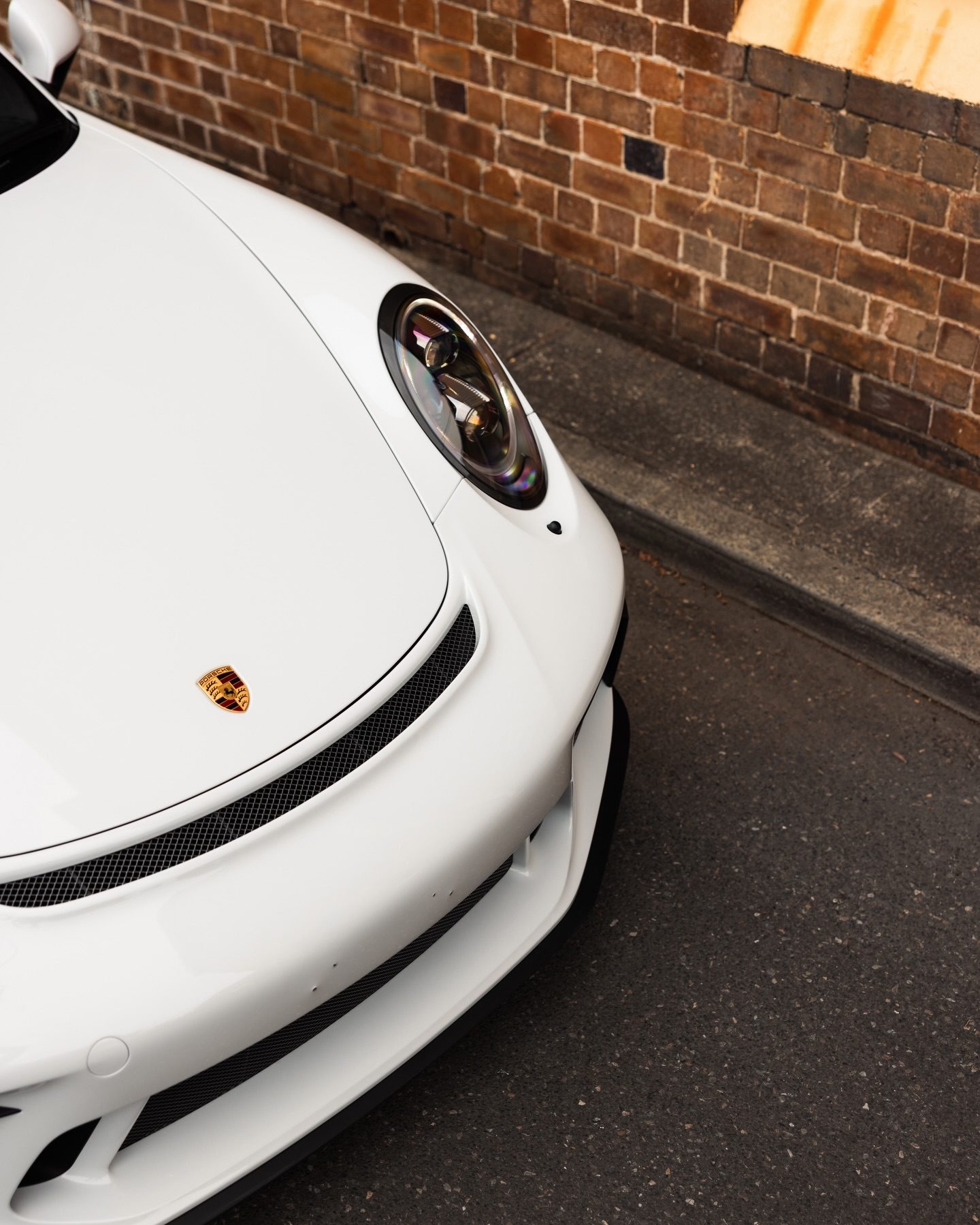 The 991.2 GT3's bonnet, crest and headlight, flawless under film