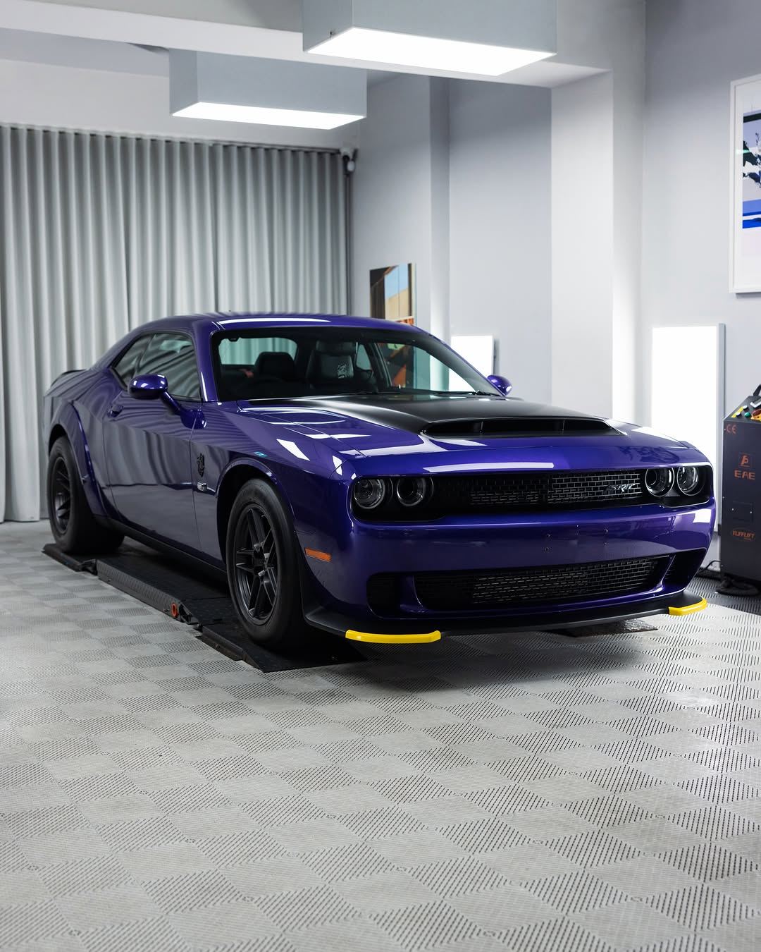 Purple Dodge Challenger SRT in the studio, front three-quarter view